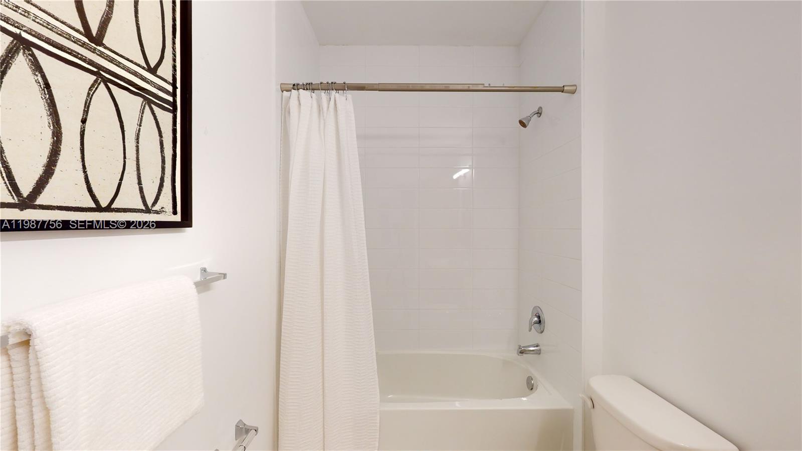 24705 Southwest 129th Avenue, Unit 110 Homestead, FL 33032 - Photo 26 of 33 a bathroom with a shower