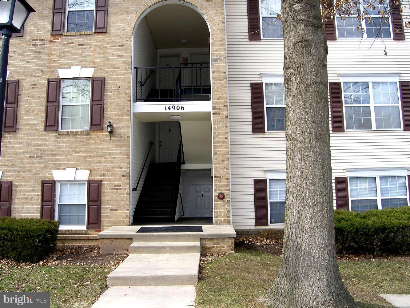 14906 McKisson Court, Unit B Silver Spring, MD 20906 - Photo 1 of 27 a front view of a house with a yard
