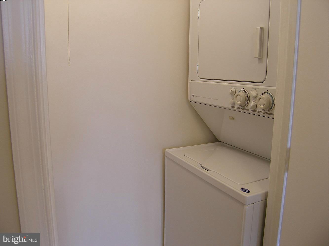 14906 McKisson Court, Unit B Silver Spring, MD 20906 - Photo 12 of 27 a utility room with dryer and washer
