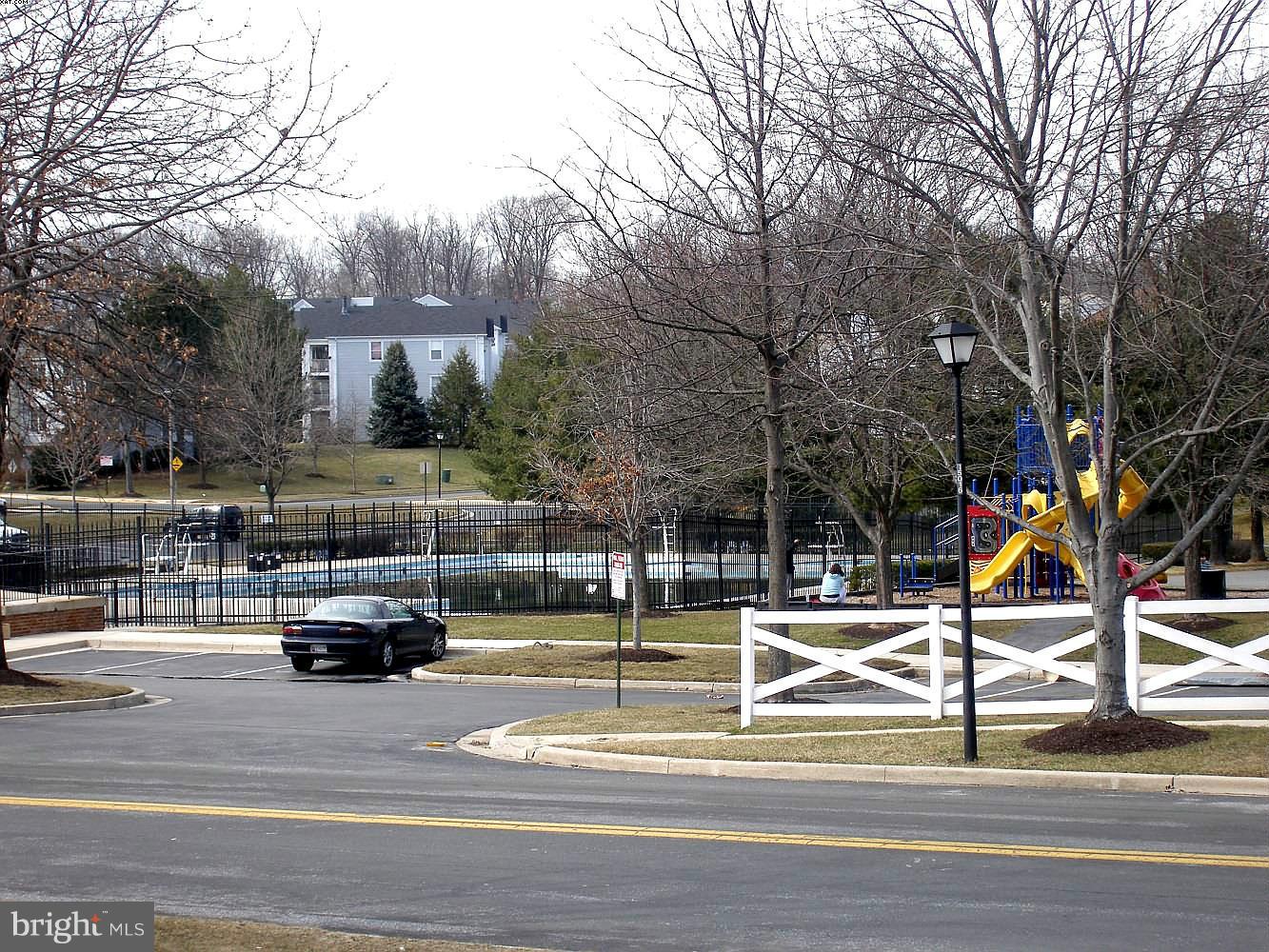 14906 McKisson Court, Unit B Silver Spring, MD 20906 - Photo 21 of 27 a view of outdoor space with parked cars