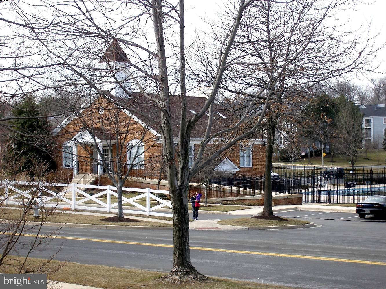 14906 McKisson Court, Unit B Silver Spring, MD 20906 - Photo 22 of 27 a view of street with parked cars