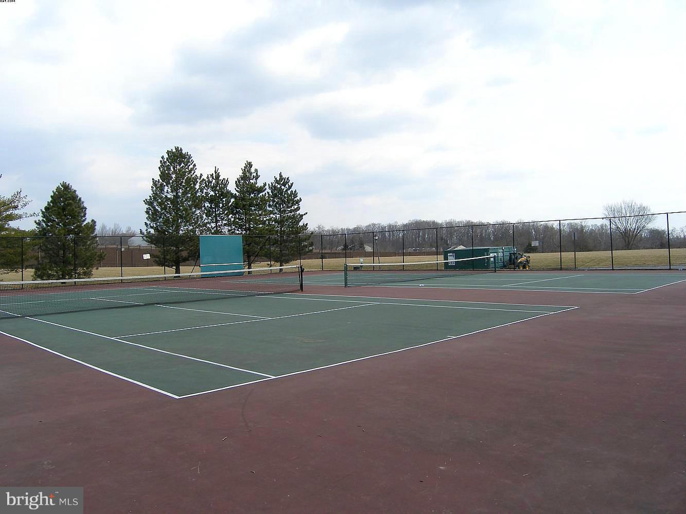 14906 McKisson Court, Unit B Silver Spring, MD 20906 - Photo 25 of 27 a view of a tennis court