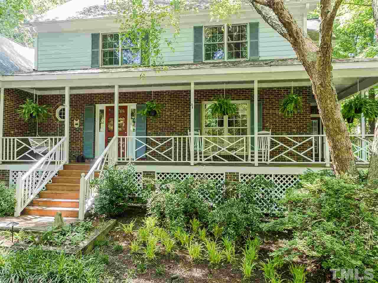 5117 Carter Street Raleigh, NC 27612 - Photo 1 of 25 Enjoy sitting on the beautiful wrap around porch! The porch was just stained and is perfect for summer evenings.