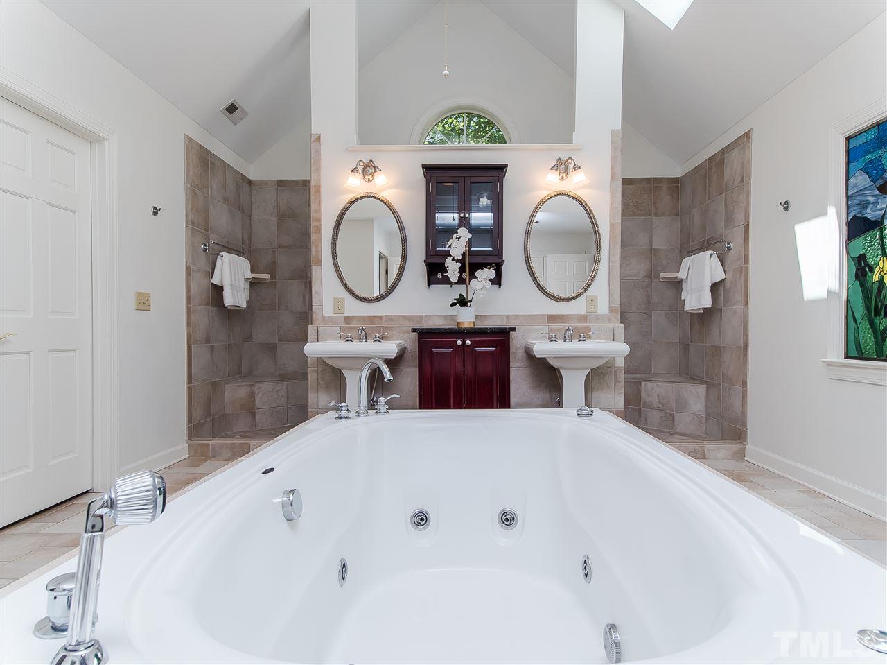 5117 Carter Street Raleigh, NC 27612 - Photo 19 of 25 Relax in your jacuzzi soaking tub after a long day!