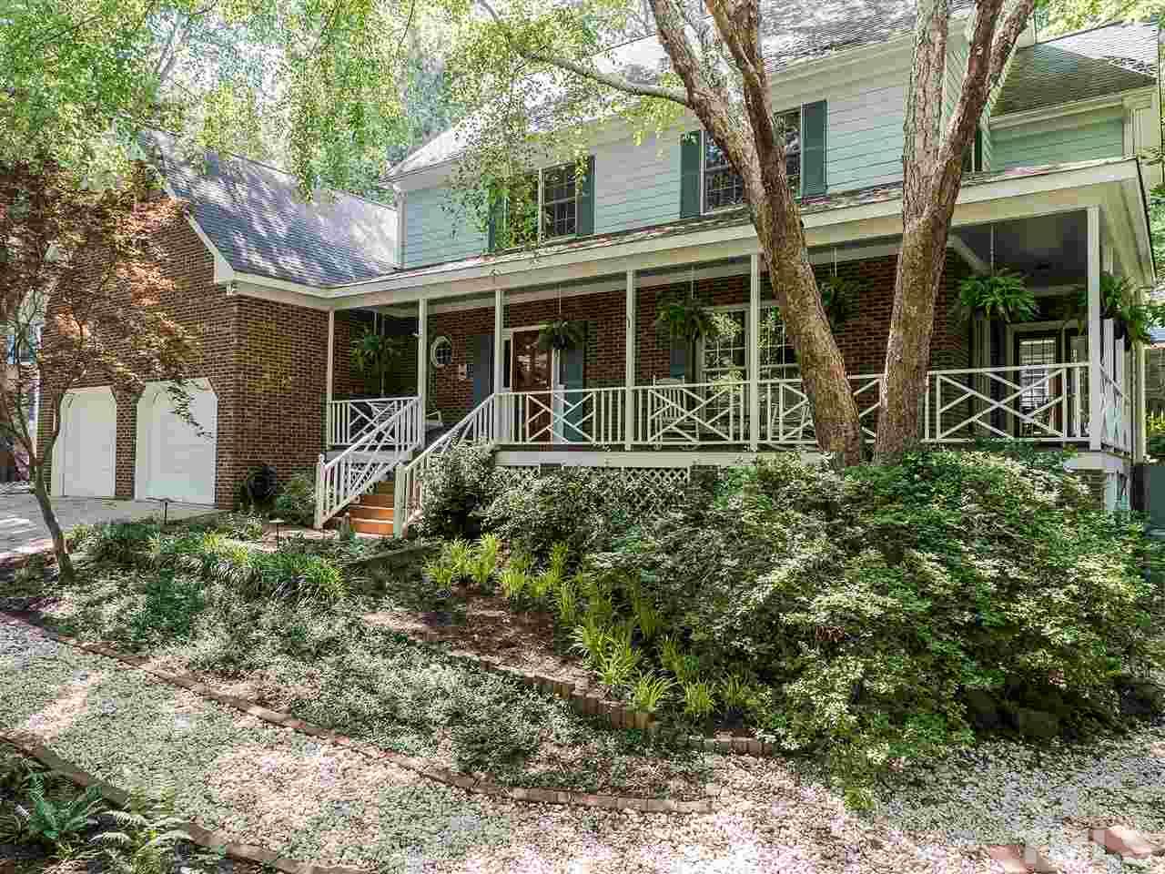 5117 Carter Street Raleigh, NC 27612 - Photo 25 of 25 One of the gravel paths that leads to one of the TWO patios. One features a water garden.