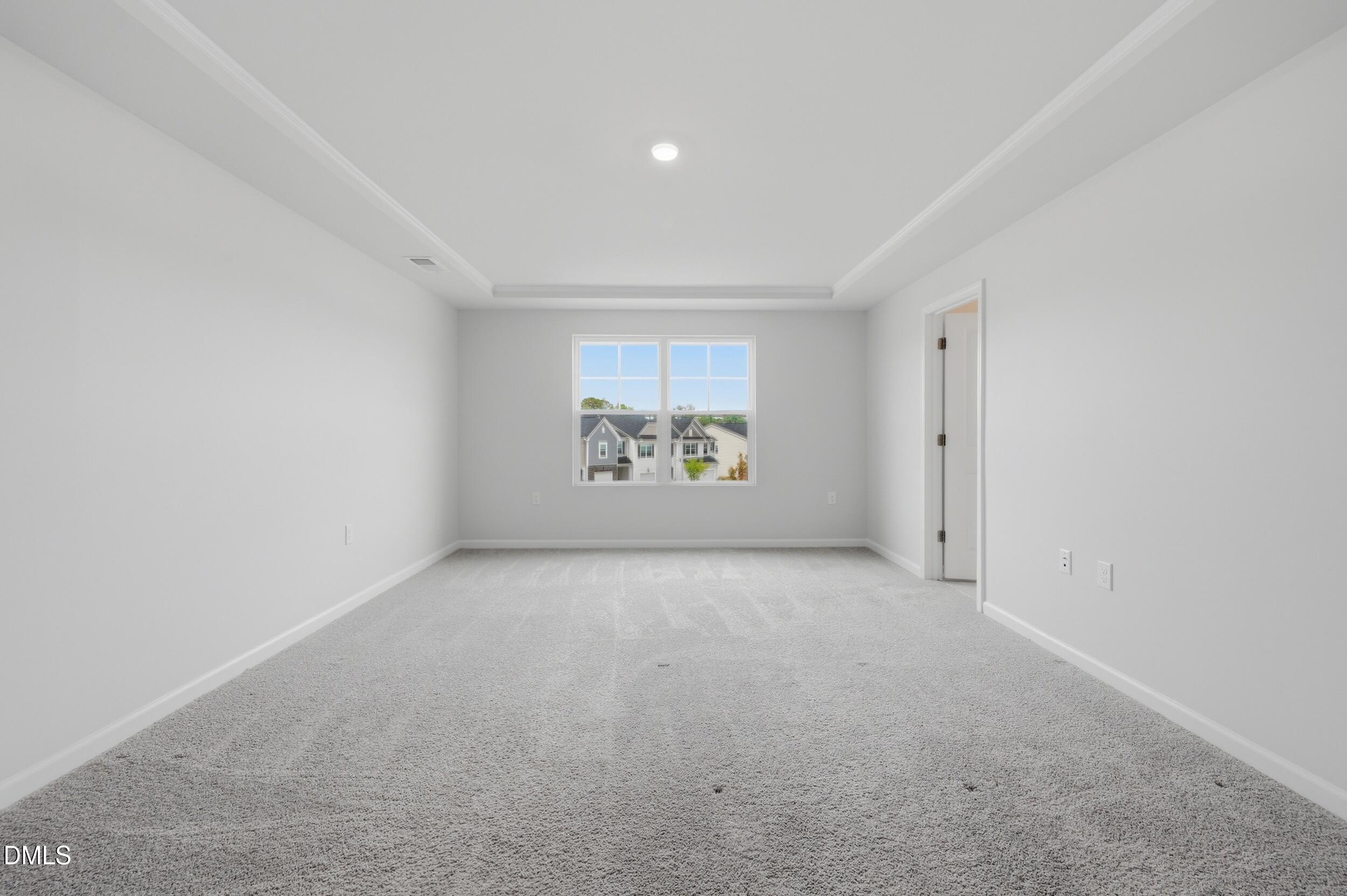 5011 Kota Street Raleigh, NC 27610 - Photo 27 of 42 an empty room with a window