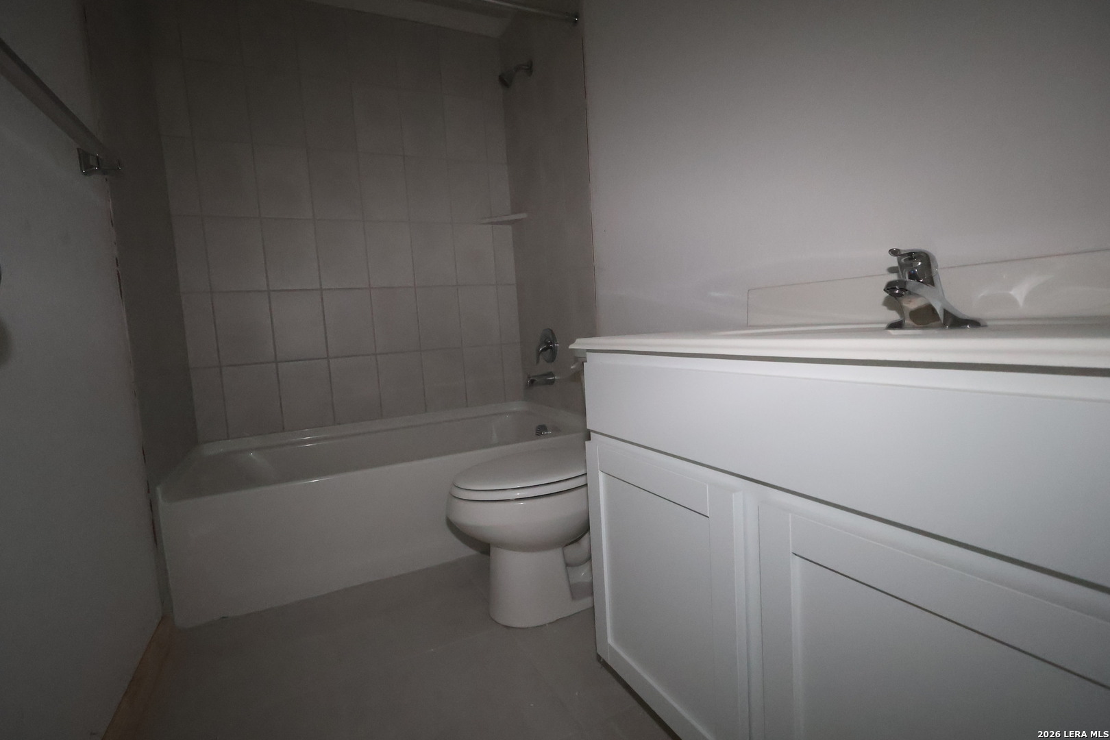 3019 Wembley Way Converse, TX 78109 - Photo 21 of 27 a bathroom with a sink a toilet and bathtub