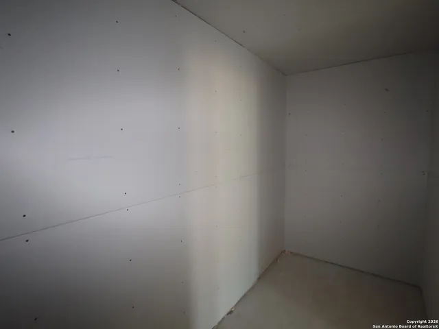 a view of a window in an empty room