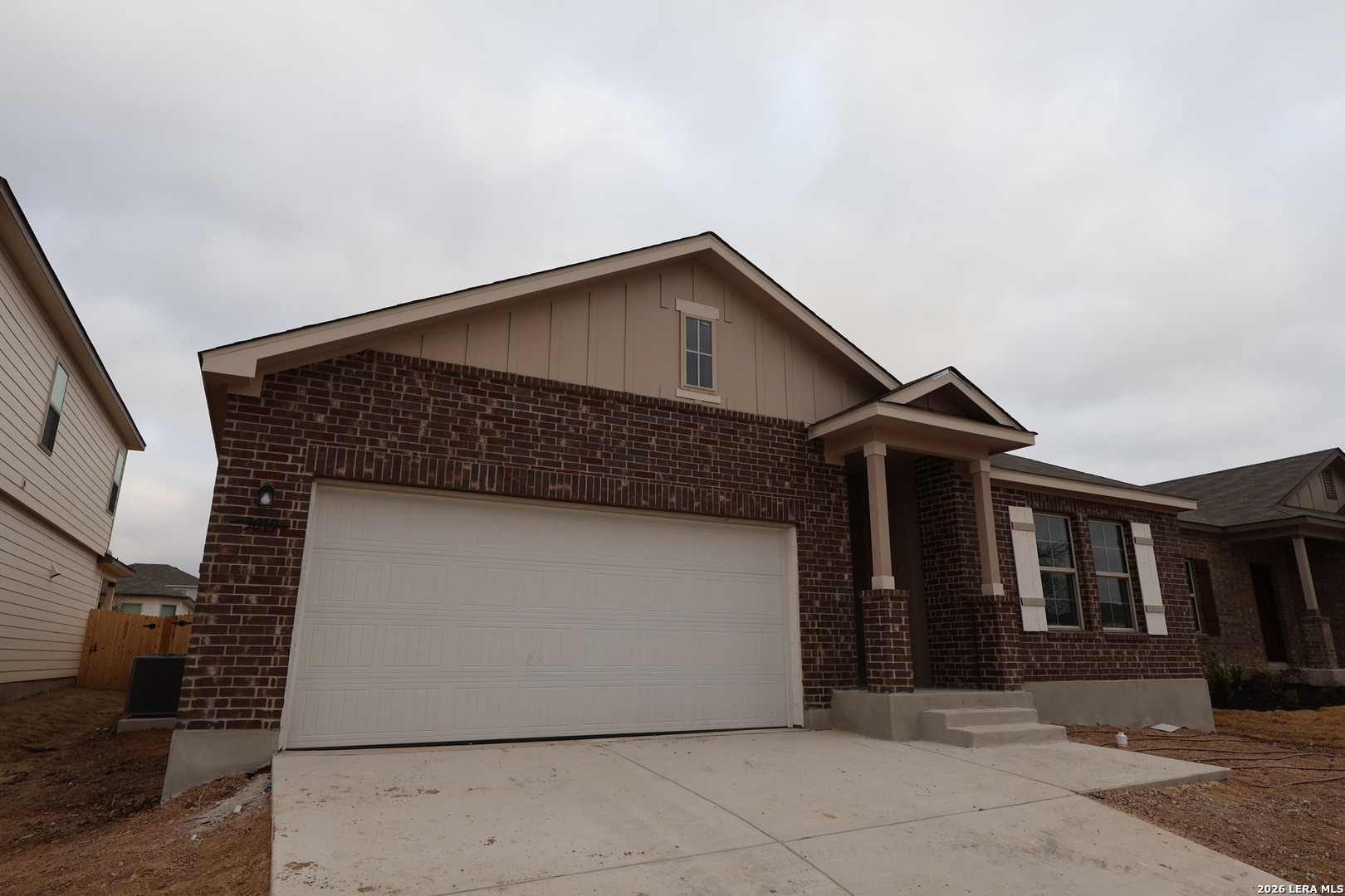 3019 Wembley Way Converse, TX 78109 - Photo 26 of 27 a front view of a house with garage