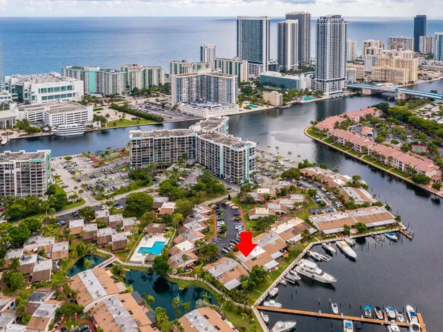 a view of a car parked in front of a house