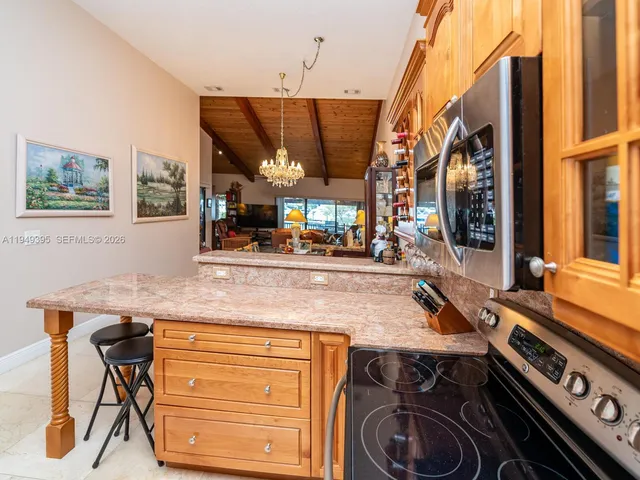 a living room with lots of furniture and a flat screen tv