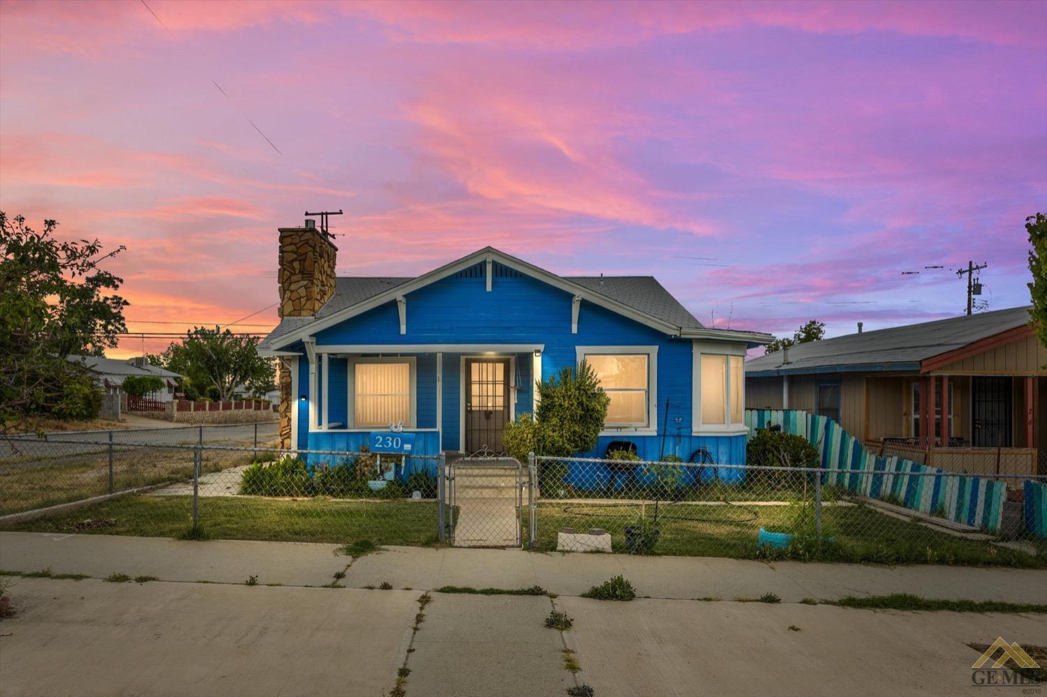 Undisclosed Address Taft, CA 93268 - Photo 1 of 21 a front view of a house with garden
