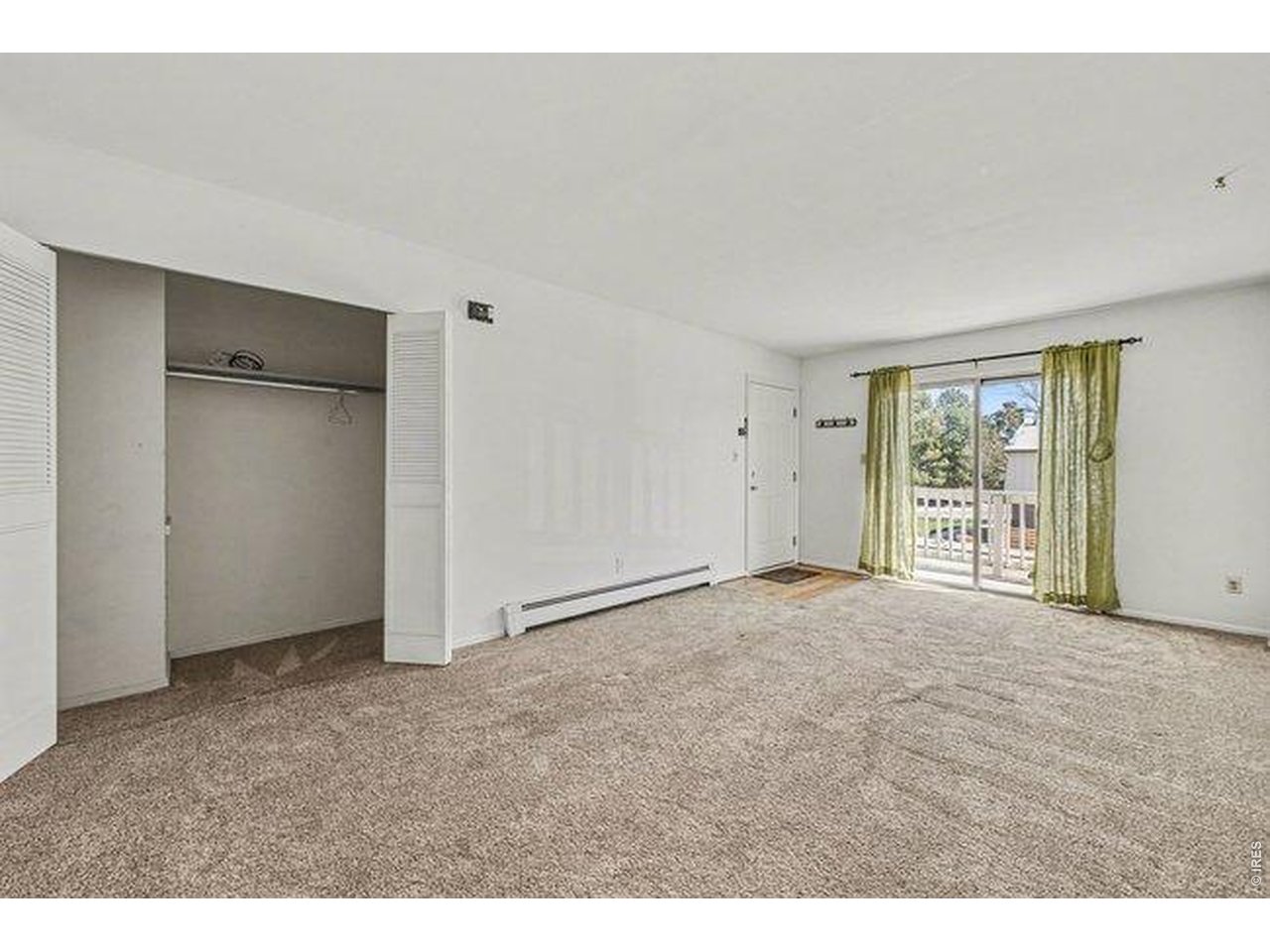 905 East Swallow Road, Unit 4 Fort Collins, CO 80525 - Photo 7 of 25 a view of an empty room with a window