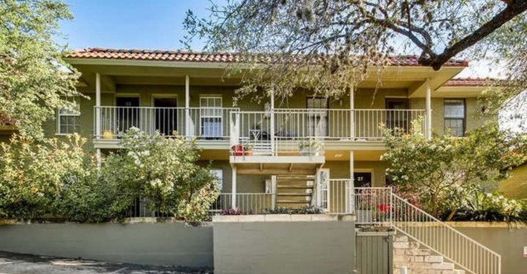 2302 East Side Drive, Unit 30 Austin, TX 78704 - Photo 18 of 22 a house view with a garden space