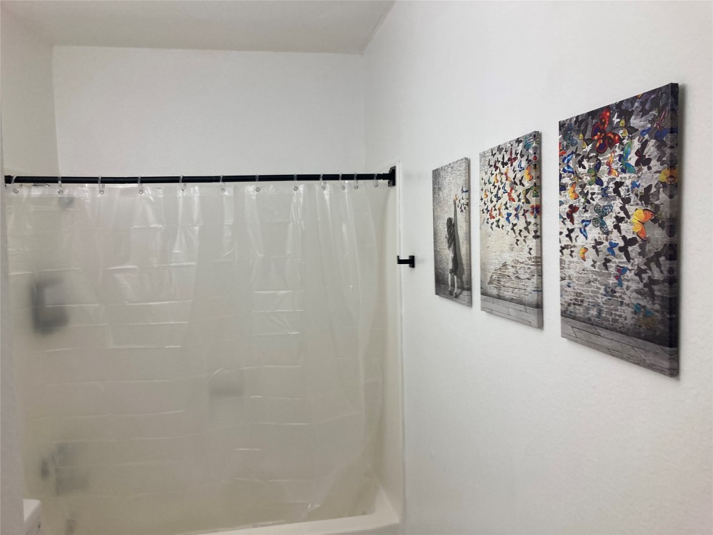 2302 East Side Drive, Unit 30 Austin, TX 78704 - Photo 8 of 22 a view of a hardwood and shower