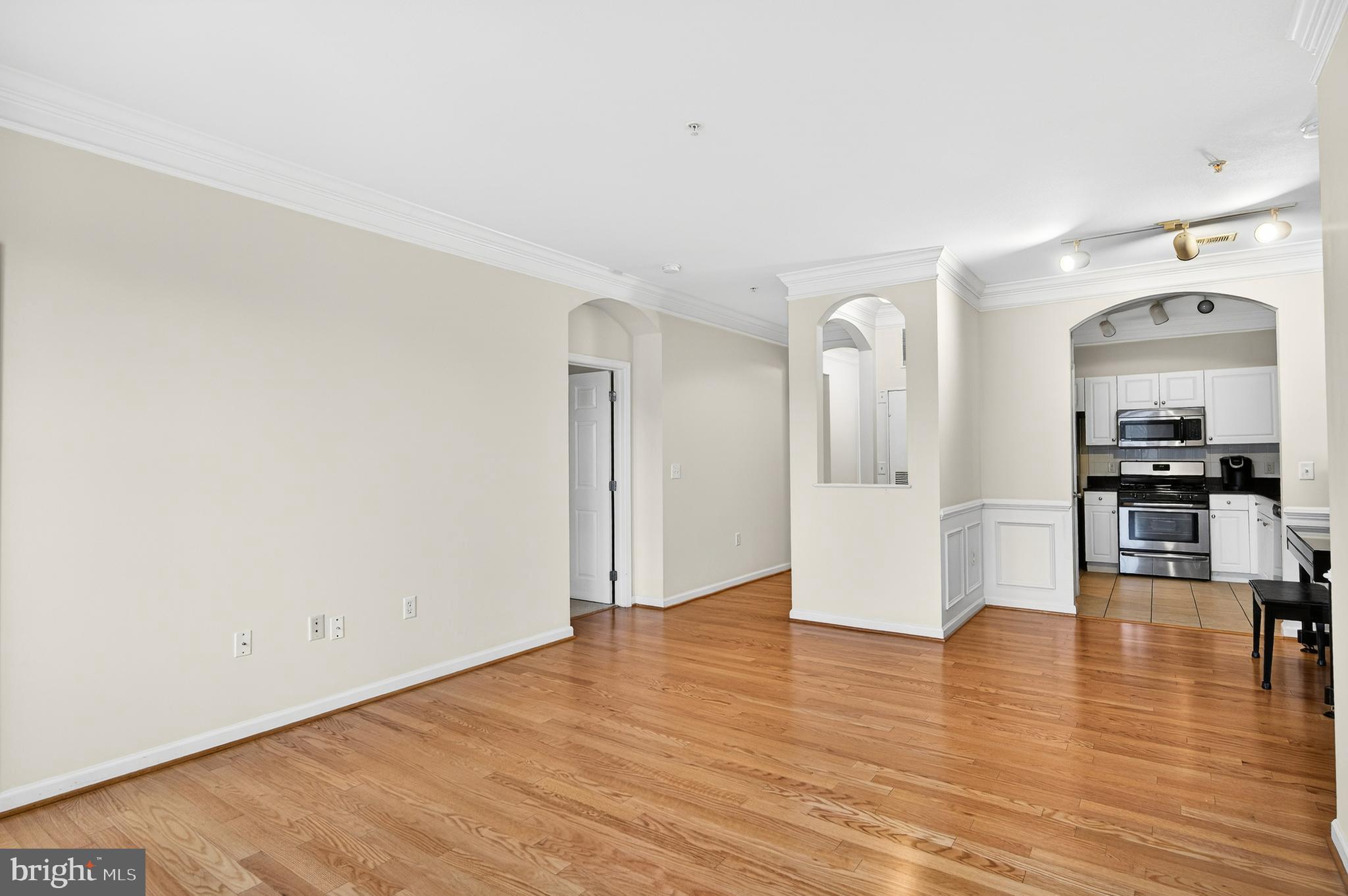 16 Granite Place, Unit 280 Gaithersburg, MD 20878 - Photo 13 of 47 a view of empty room with wooden floor