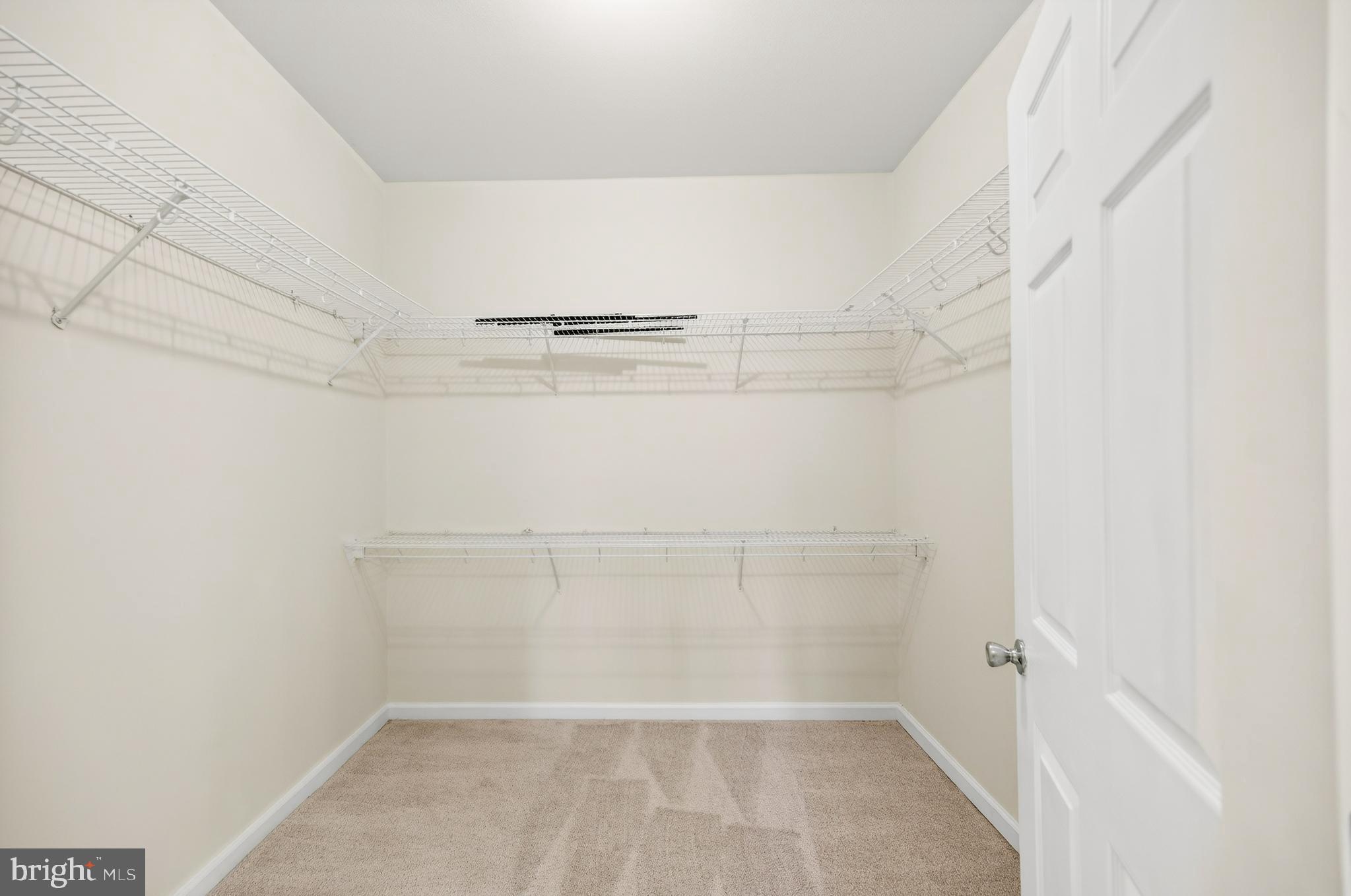 16 Granite Place, Unit 280 Gaithersburg, MD 20878 - Photo 22 of 47 a view of a room with racks on the wall