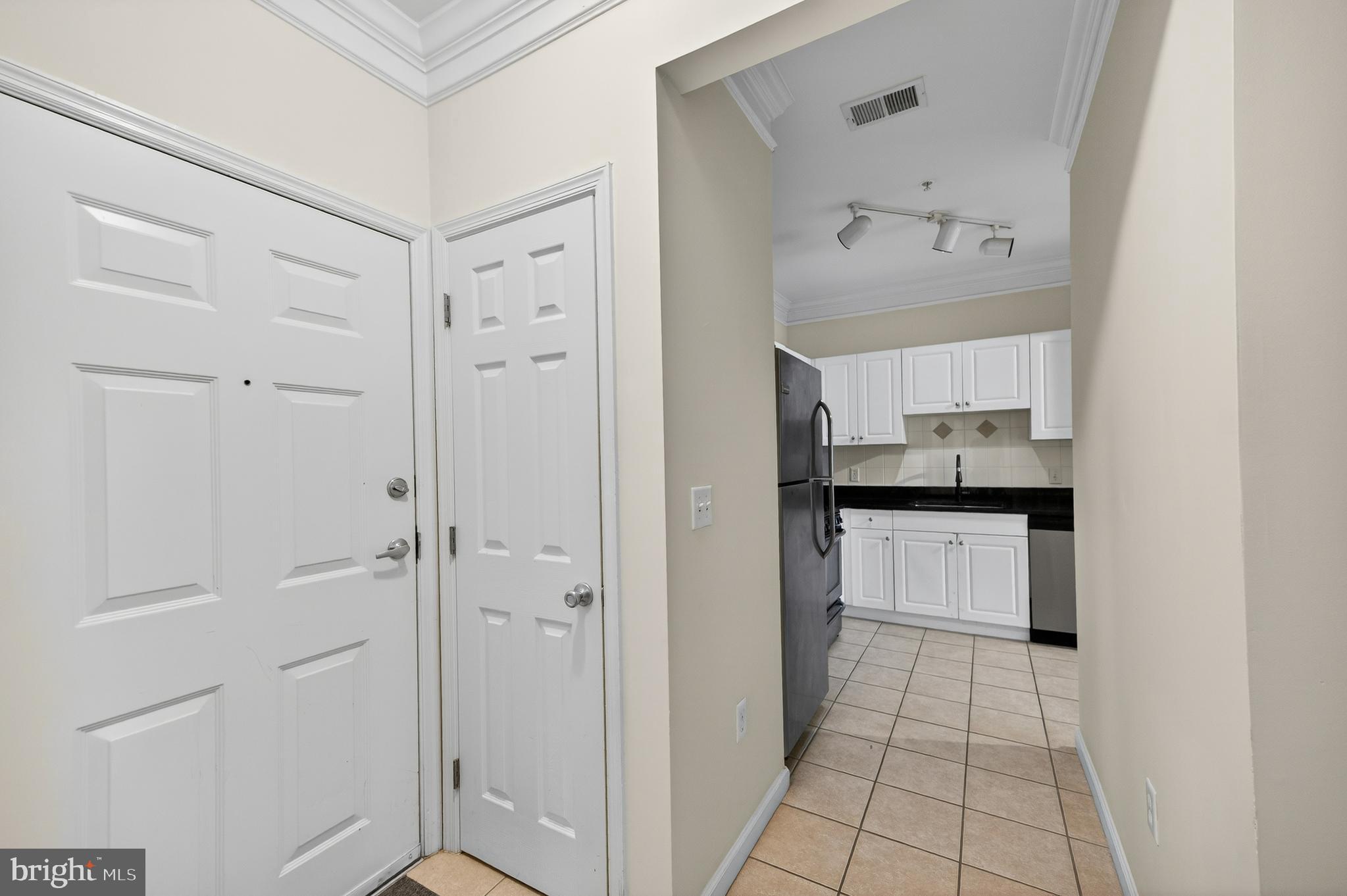 16 Granite Place, Unit 280 Gaithersburg, MD 20878 - Photo 7 of 47 a view of kitchen with white cabinets