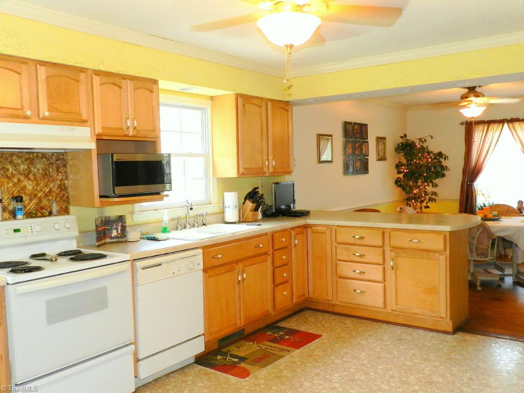 5406 Mockingbird Road Greensboro, NC 27406 - Photo 11 of 30 Lots of space, lots of cabinets!