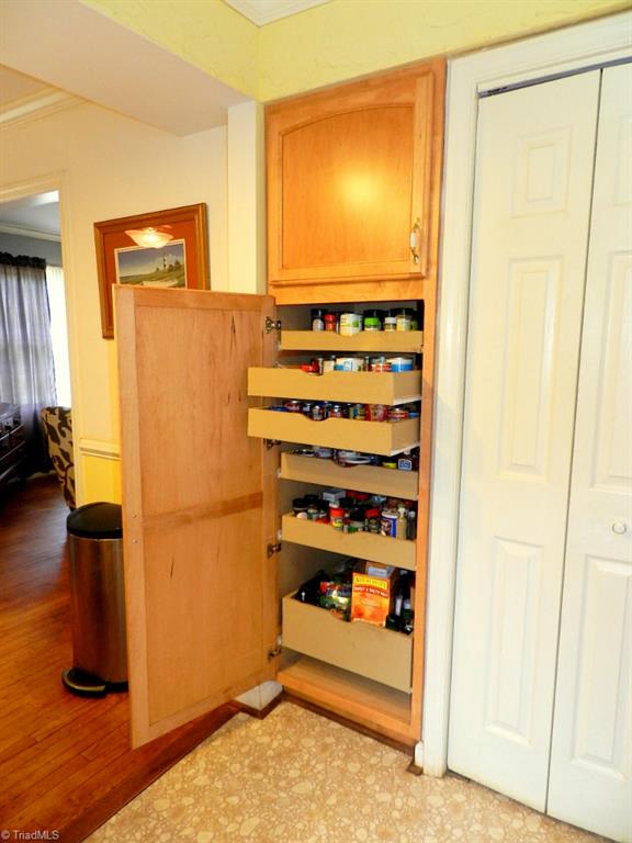 5406 Mockingbird Road Greensboro, NC 27406 - Photo 13 of 30 Love the roll out shelves...makes finding things super easy!