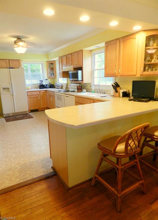 5406 Mockingbird Road Greensboro, NC 27406 - Photo 15 of 30 Convenient kitchen bartop makes a great place to enjoy your morning coffee!