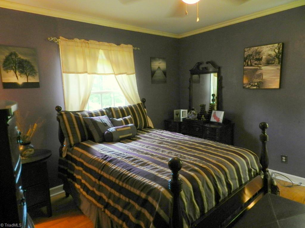 5406 Mockingbird Road Greensboro, NC 27406 - Photo 19 of 30 Hardwood floors in bedrooms too!