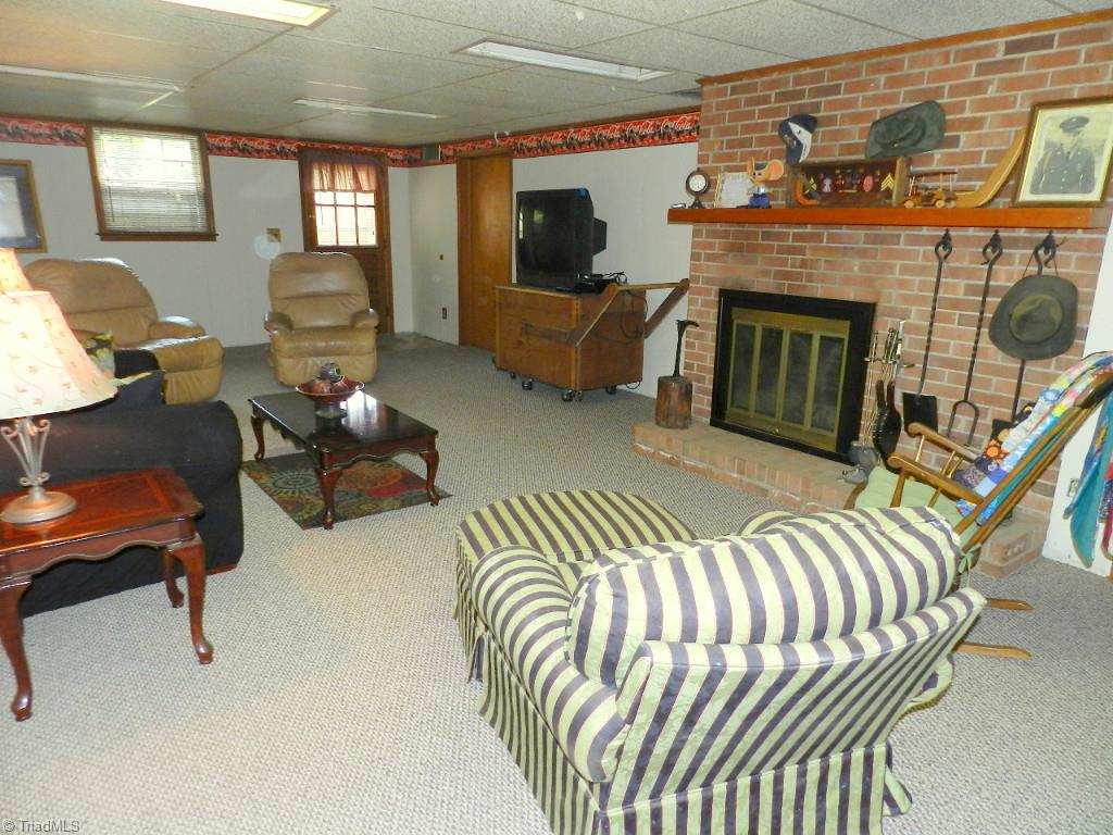 5406 Mockingbird Road Greensboro, NC 27406 - Photo 24 of 30 Big basement with new carpet