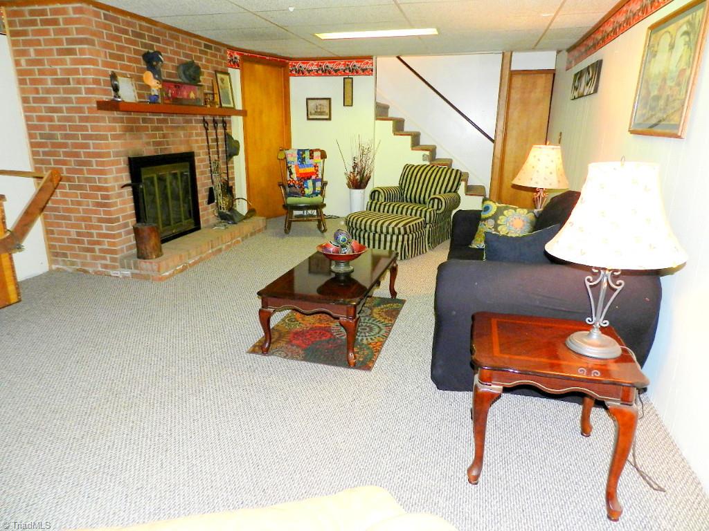 5406 Mockingbird Road Greensboro, NC 27406 - Photo 26 of 30 Basement also features over 500 sq ft of storage and workroom space....for all your projects!