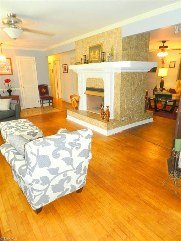 5406 Mockingbird Road Greensboro, NC 27406 - Photo 5 of 30 Love the hardwood floors on the main level!