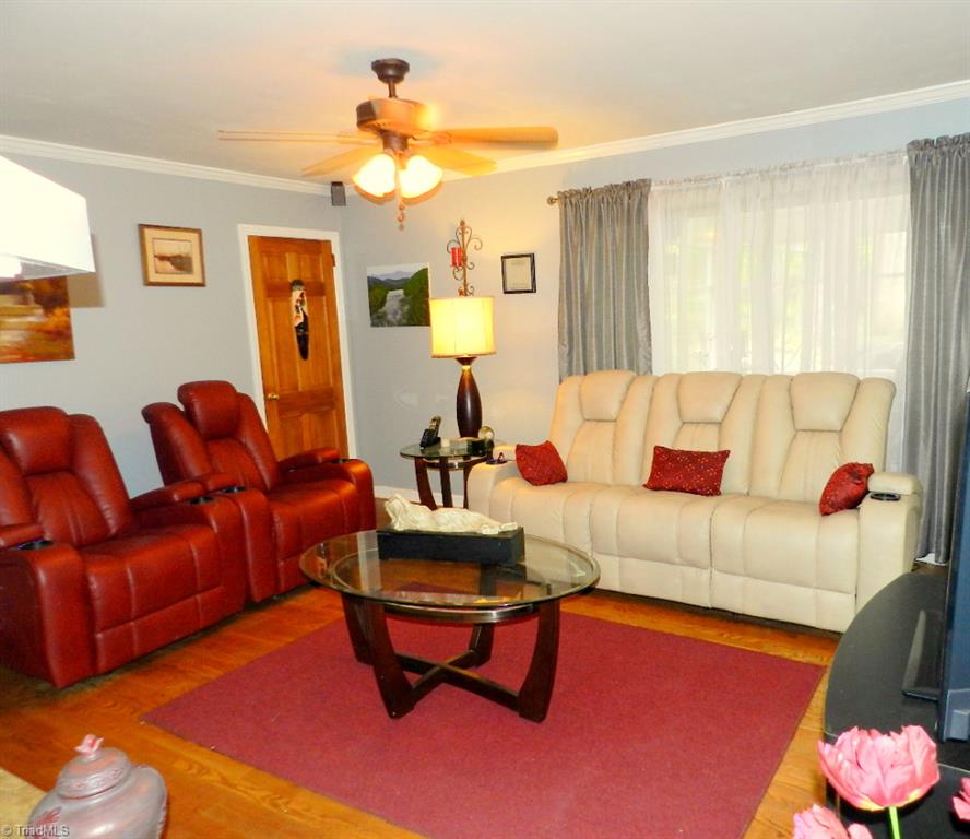 5406 Mockingbird Road Greensboro, NC 27406 - Photo 7 of 30 Comfy den is next to the kitchen.