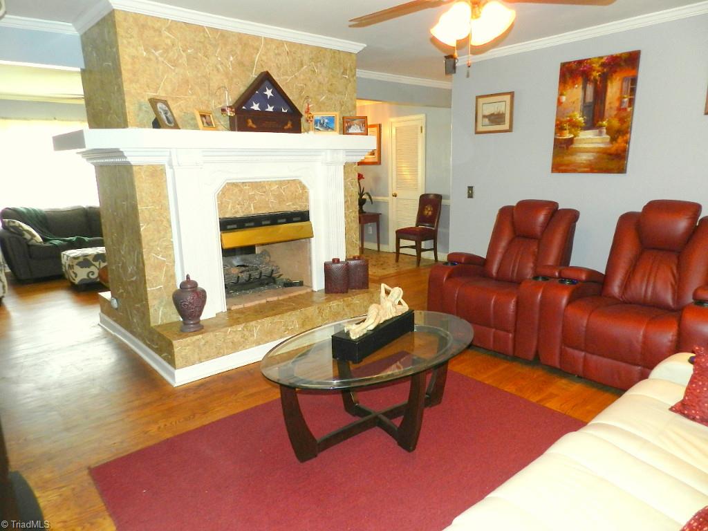 5406 Mockingbird Road Greensboro, NC 27406 - Photo 8 of 30 Another look at the den looking at fireplace.