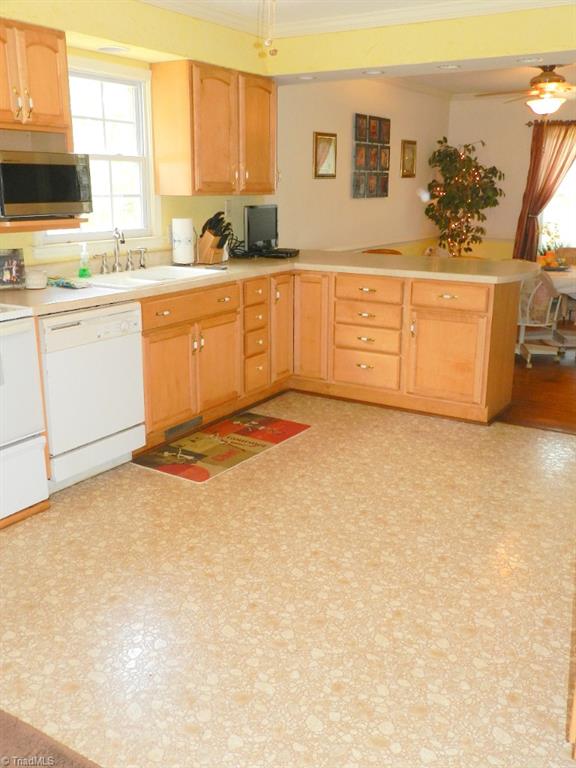 5406 Mockingbird Road Greensboro, NC 27406 - Photo 10 of 30 Spacious kitchen with lots and lots of cabinets!