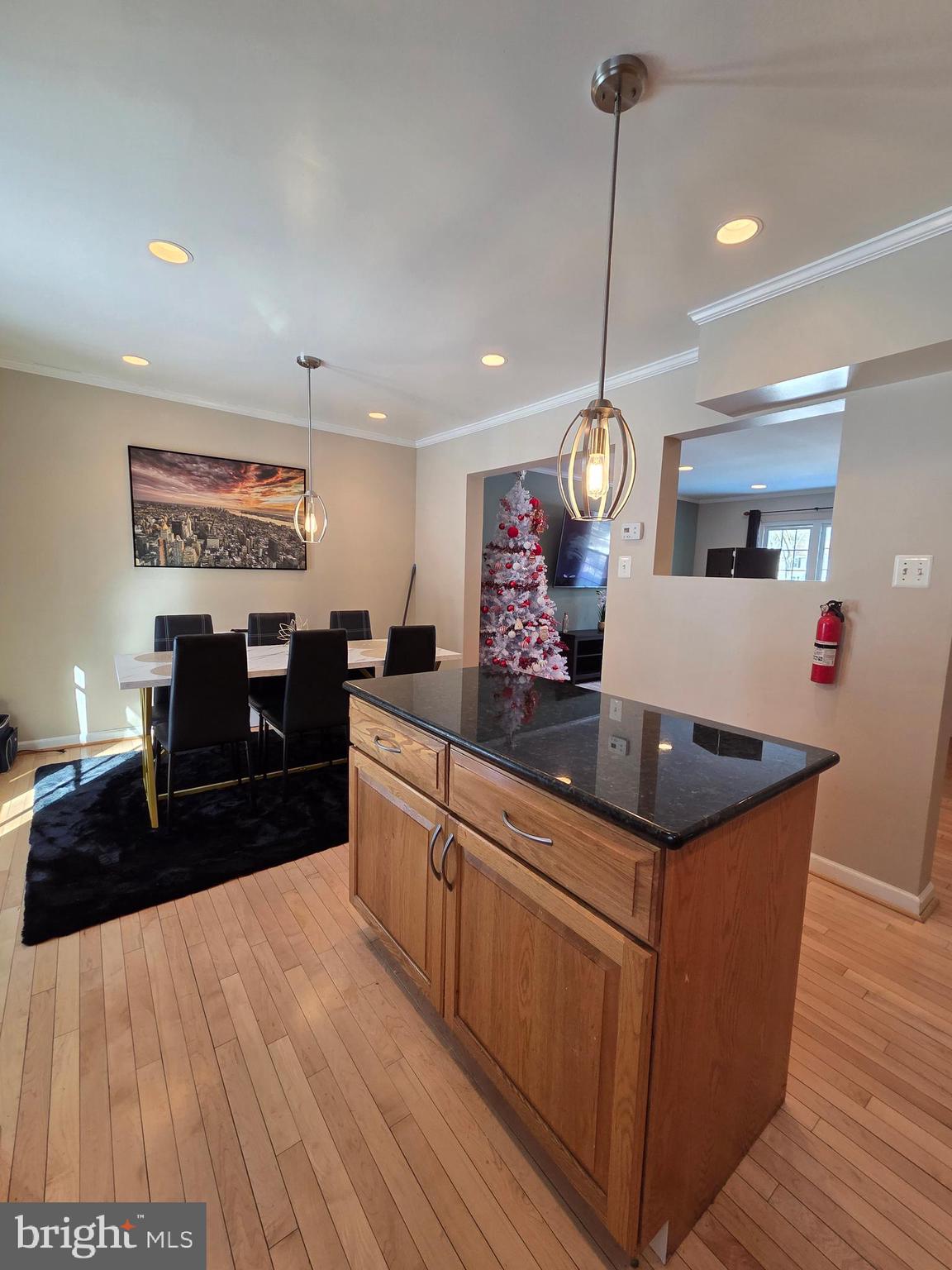 2122 Princess Anne Court Bowie, MD 20716 - Photo 14 of 37 a kitchen with stainless steel appliances granite countertop a stove a sink dishwasher and a flat screen tv