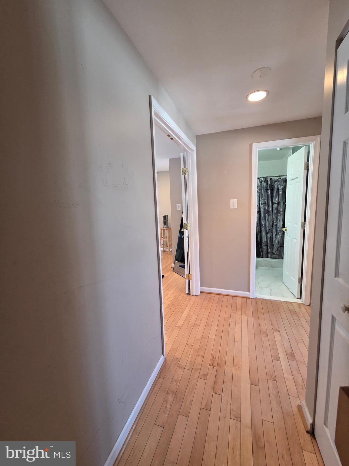 2122 Princess Anne Court Bowie, MD 20716 - Photo 16 of 37 a view of a hallway with wooden floor