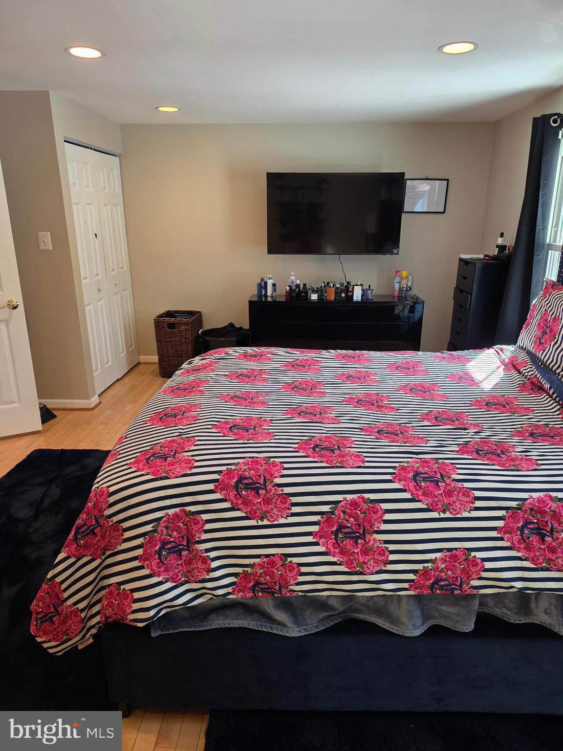 2122 Princess Anne Court Bowie, MD 20716 - Photo 20 of 37 a bedroom with a bed and a flat screen tv