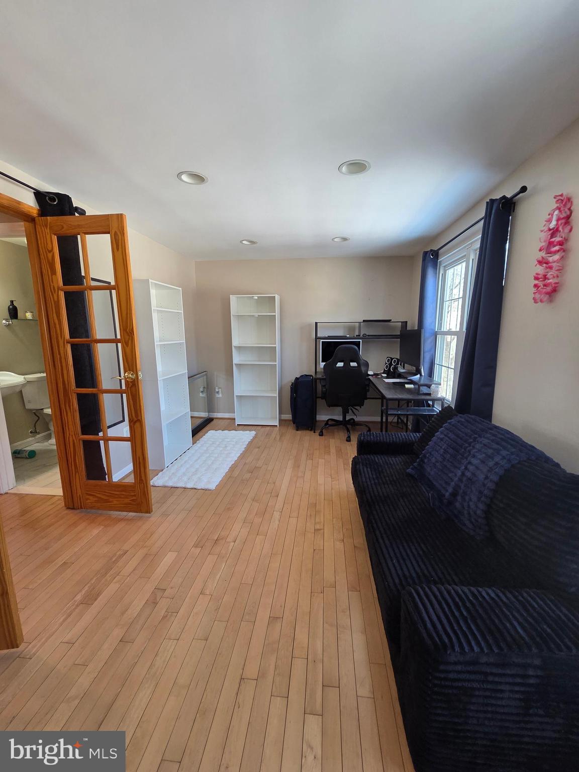 2122 Princess Anne Court Bowie, MD 20716 - Photo 25 of 37 a living room with furniture and a rug
