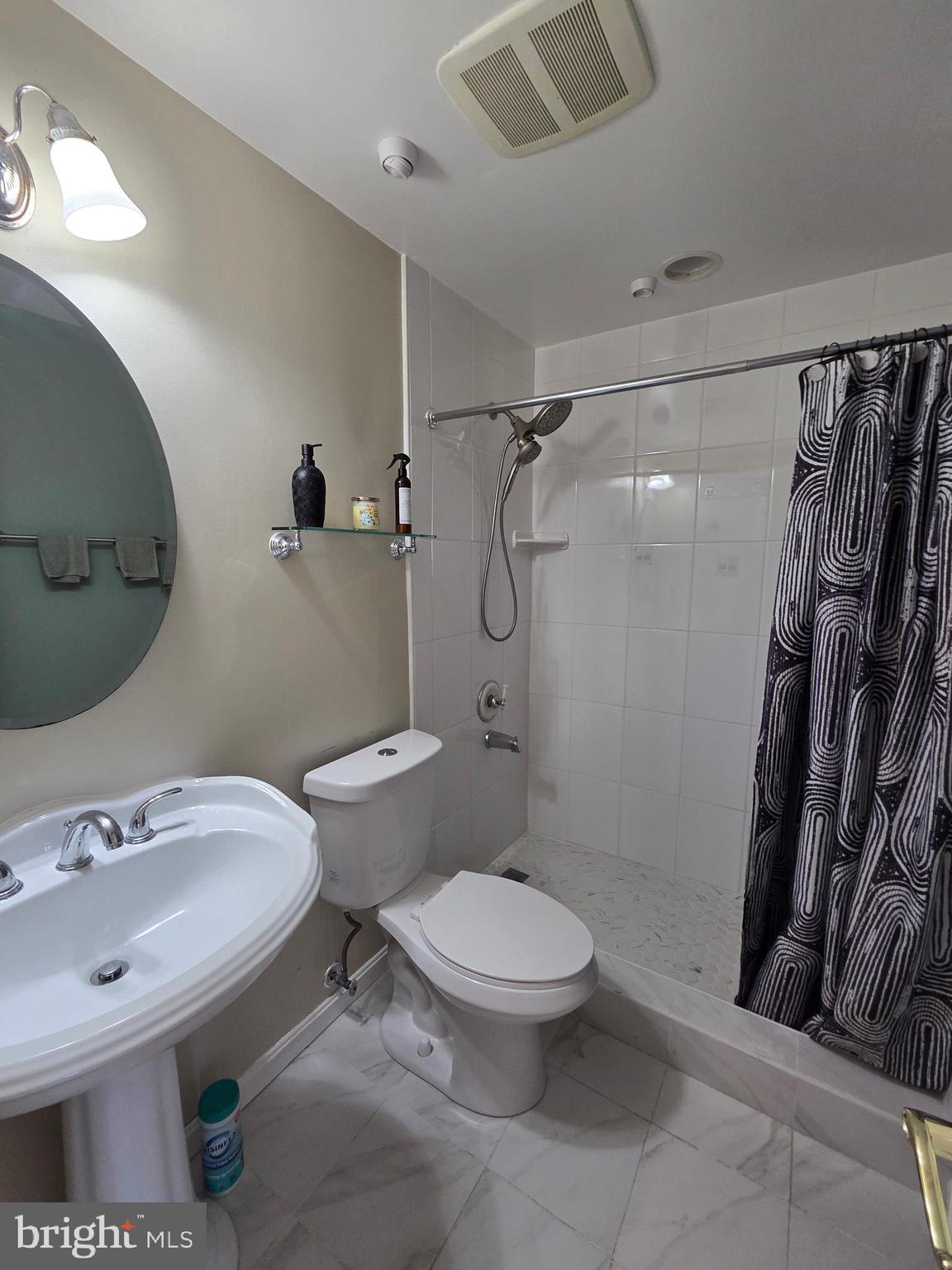 2122 Princess Anne Court Bowie, MD 20716 - Photo 28 of 37 a bathroom with a sink toilet and shower