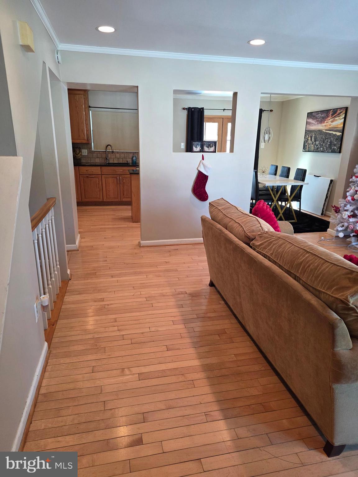 2122 Princess Anne Court Bowie, MD 20716 - Photo 6 of 37 a living room with furniture and a flat screen tv