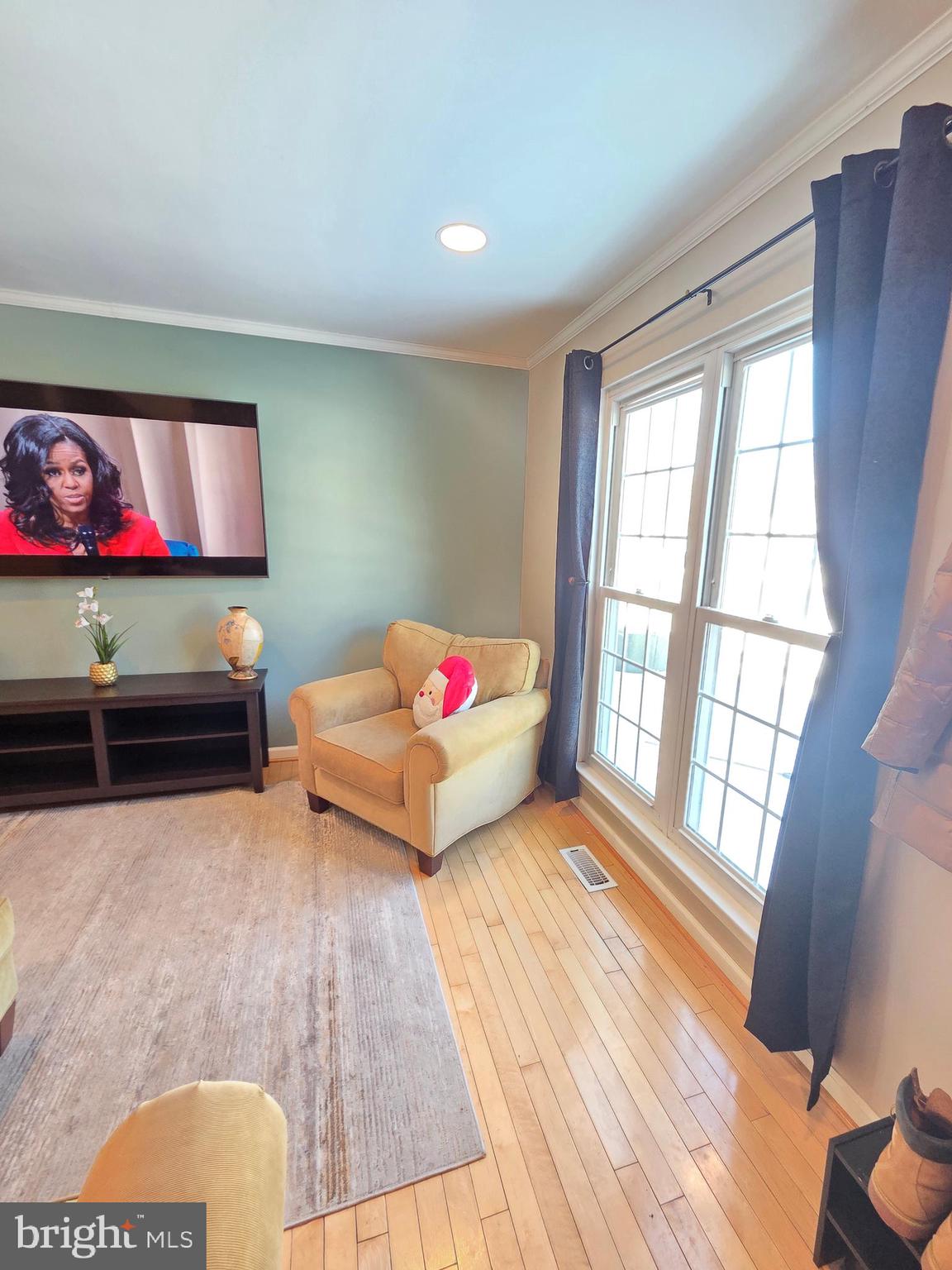 2122 Princess Anne Court Bowie, MD 20716 - Photo 7 of 37 a bedroom with furniture and a flat screen tv