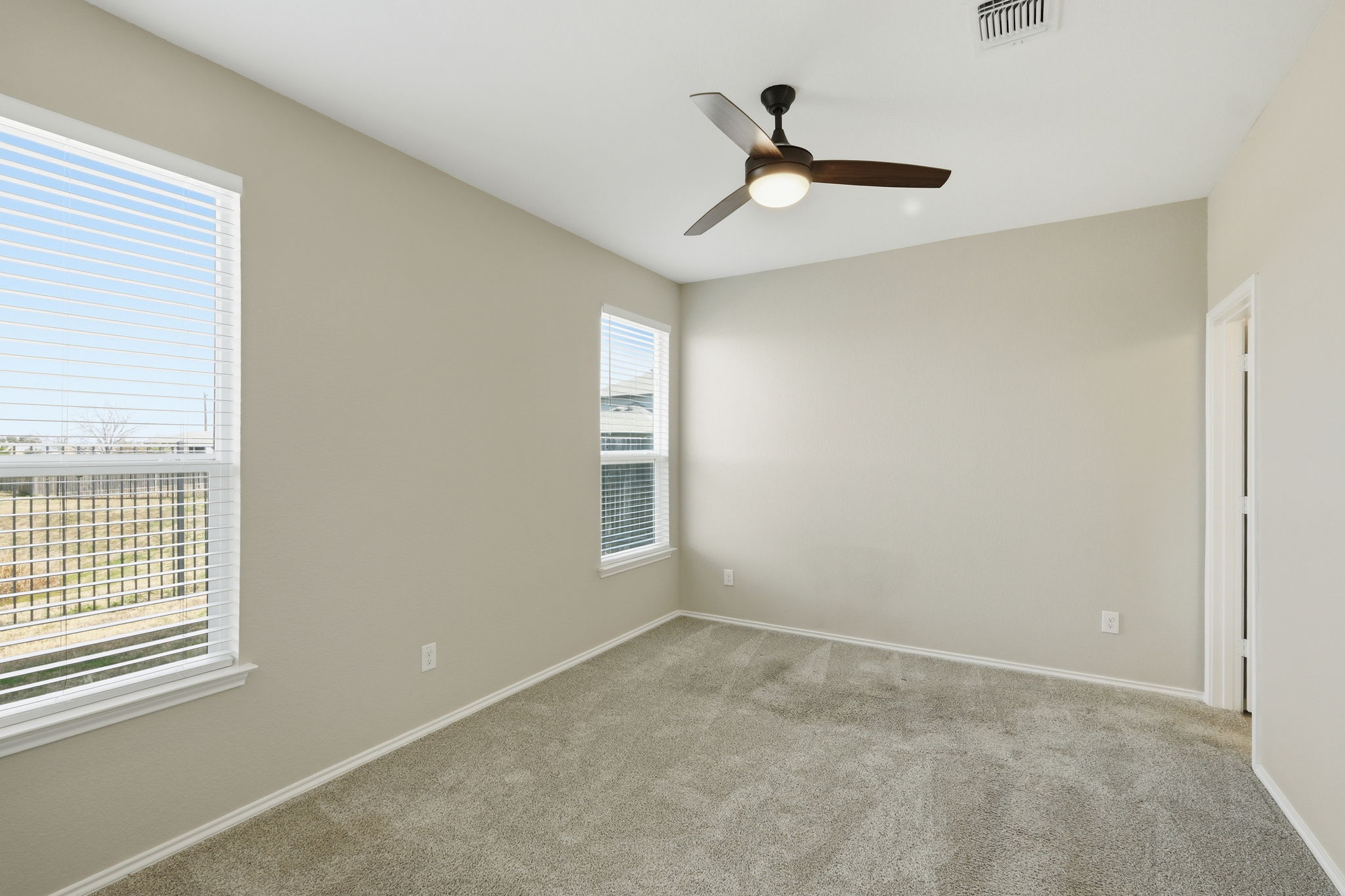 513 Thunder Valley Trail Georgetown, TX 78626 - Photo 8 of 15 Carpeted empty room featuring a ceiling fan and baseboards