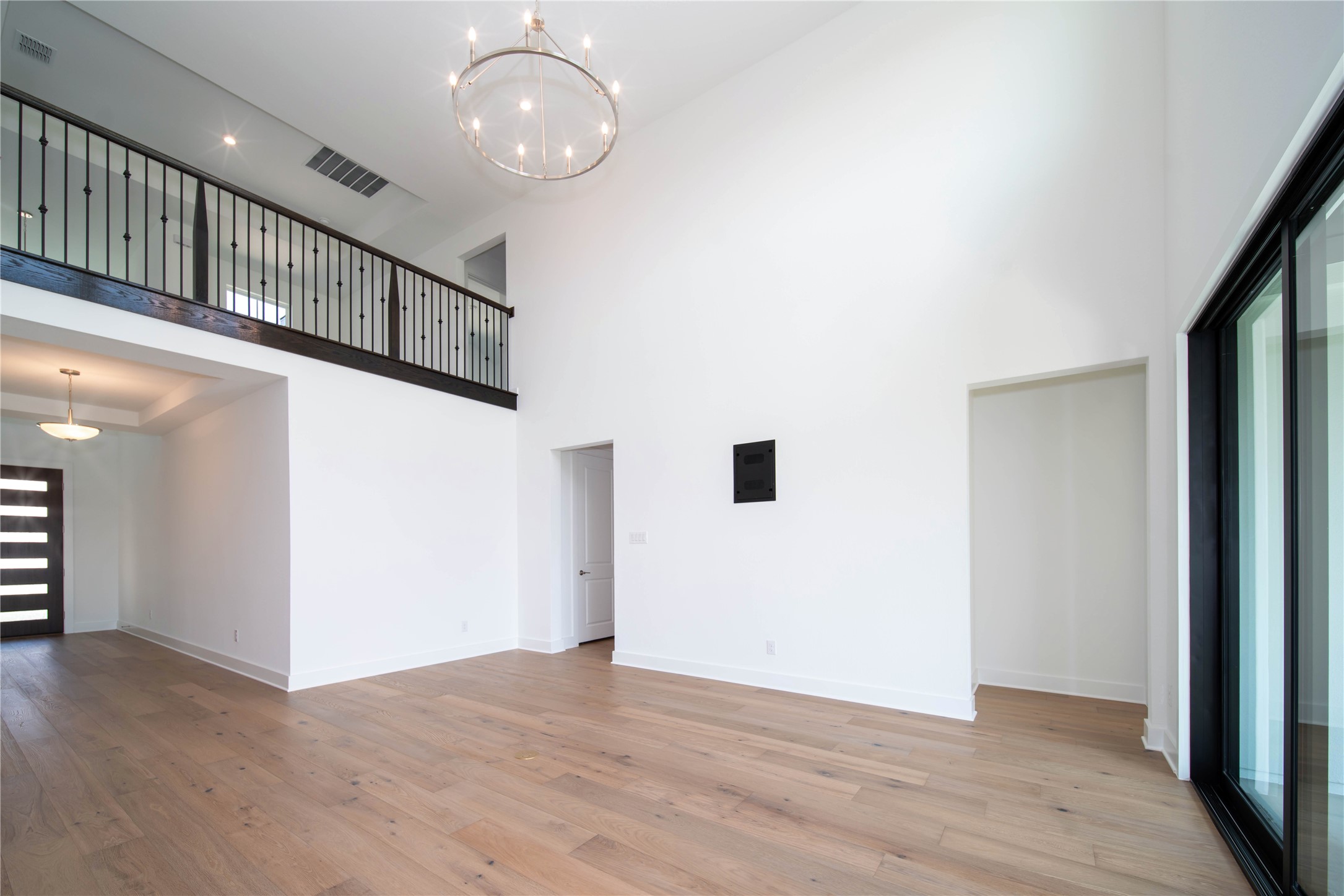 2029 Varese Path Leander, TX 78641 - Photo 19 of 32 a view of entryway with wooden floor