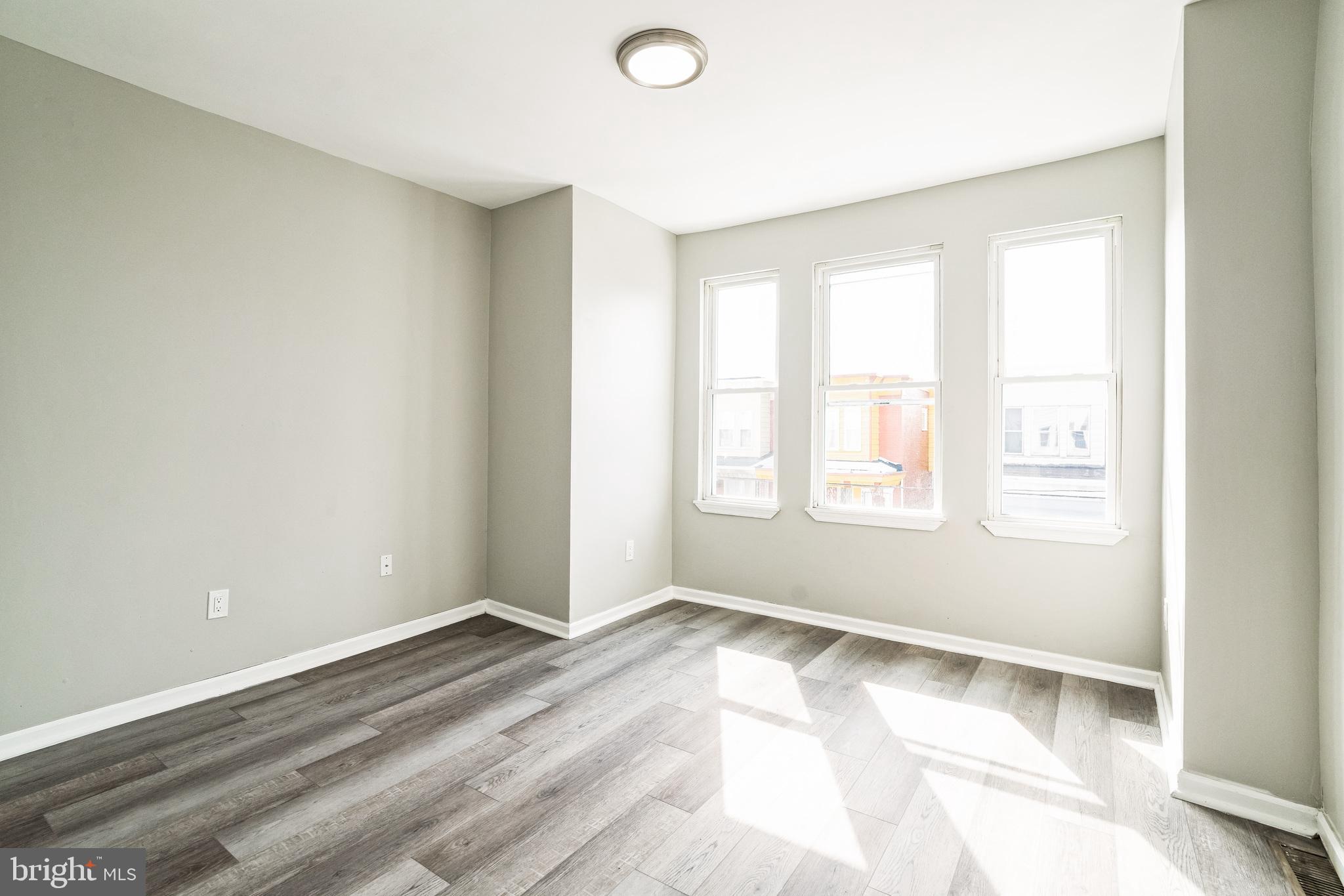 5745 Addison Street Philadelphia, PA 19143 - Photo 16 of 24 an empty room with a window