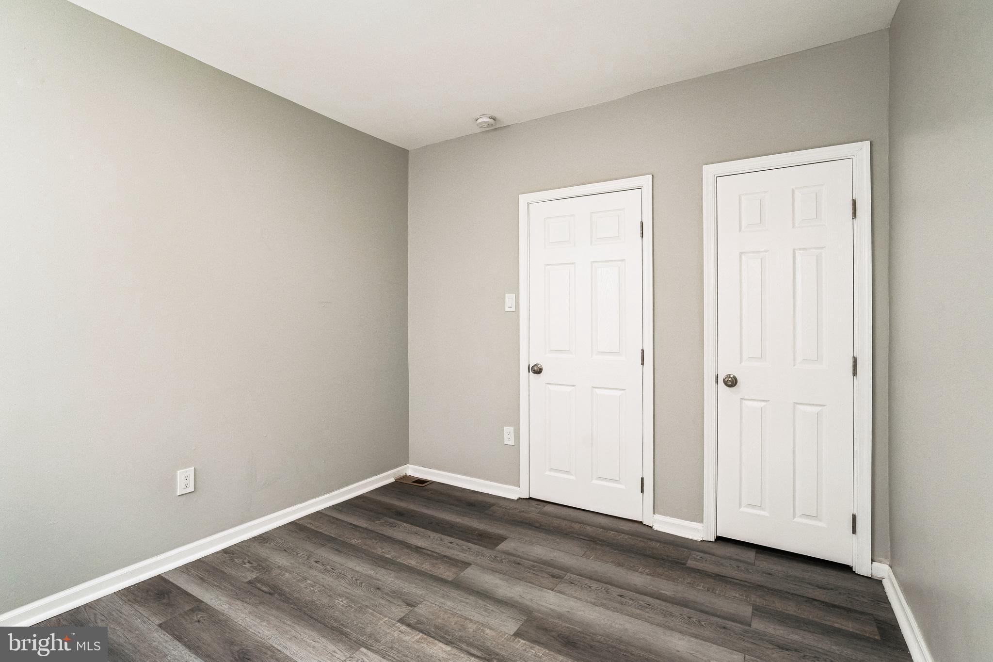 5745 Addison Street Philadelphia, PA 19143 - Photo 24 of 24 a view of an empty room with wooden floor