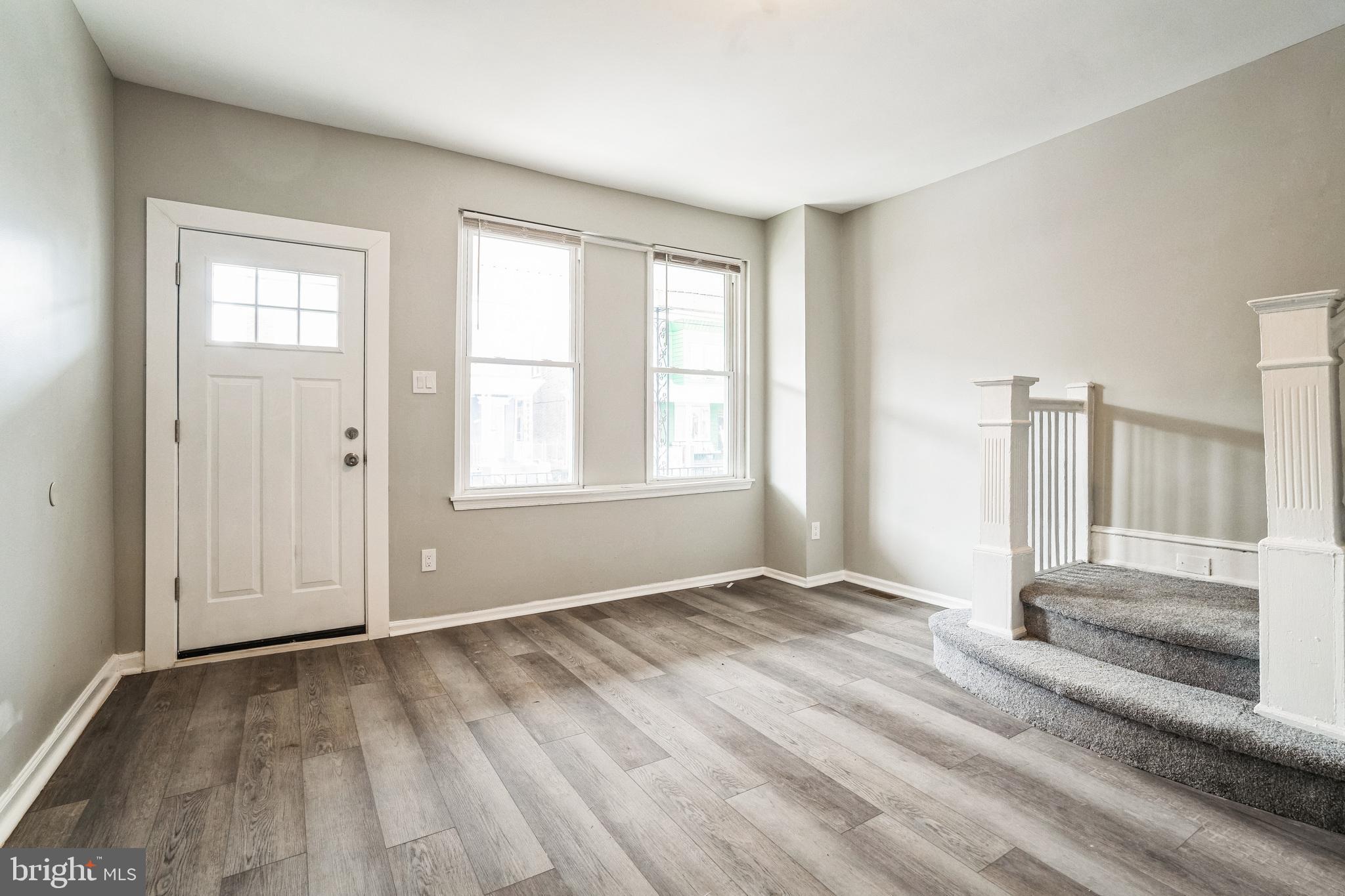 5745 Addison Street Philadelphia, PA 19143 - Photo 4 of 24 a view of livingroom with window