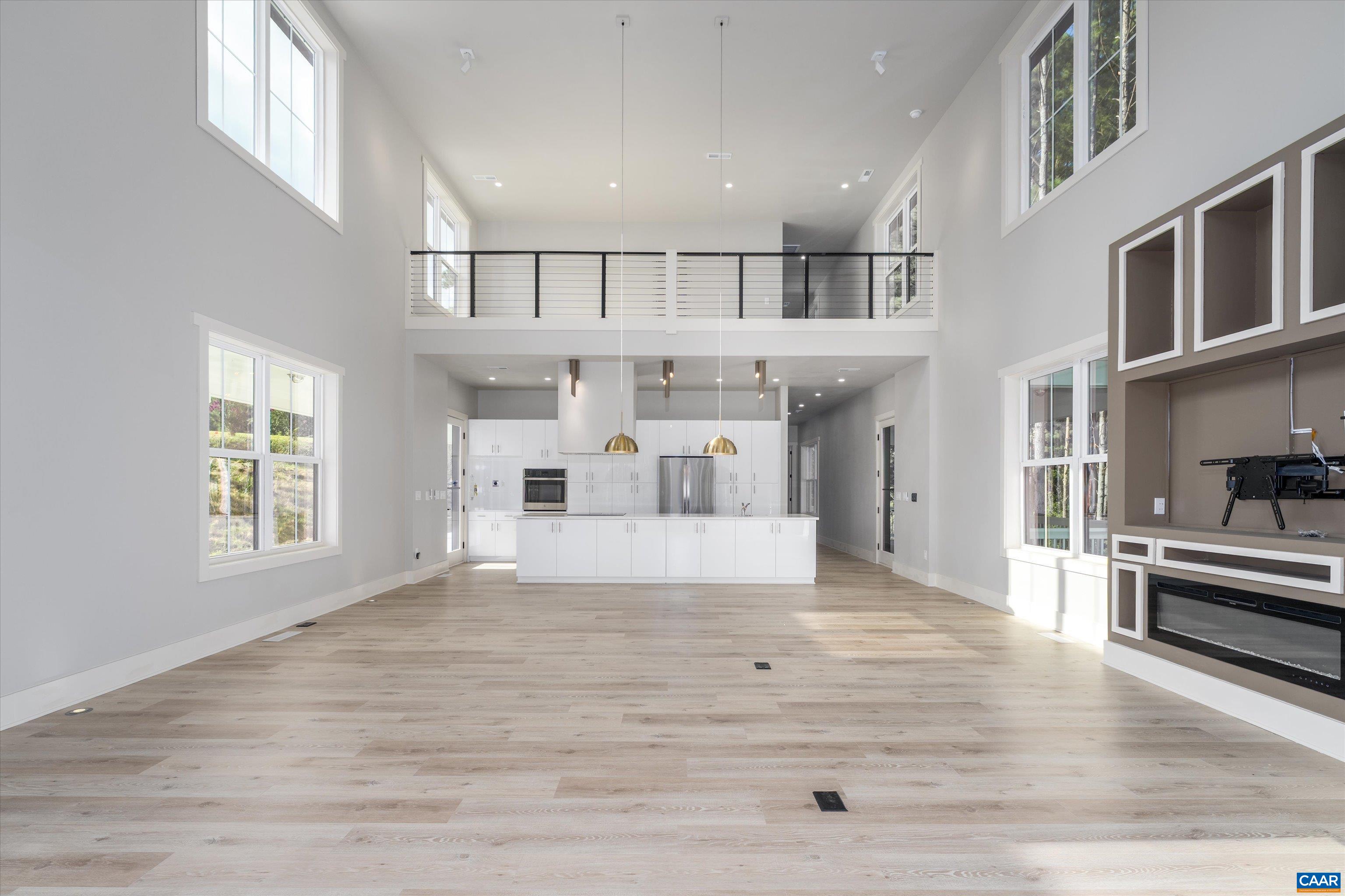 199 Ridgeview Drive Ruckersville, VA 22968 - Photo 14 of 72 a view of large kitchen with wooden floor and windows