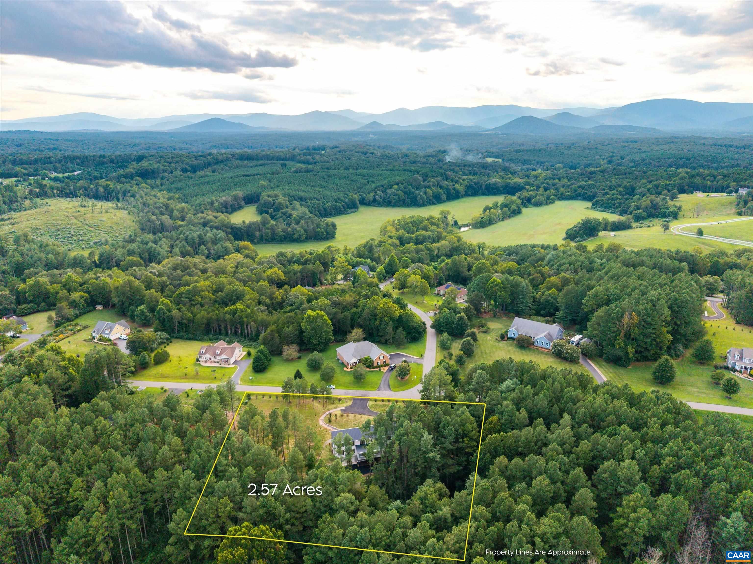 199 Ridgeview Drive Ruckersville, VA 22968 - Photo 2 of 72 a view of a lake with mountains in the back