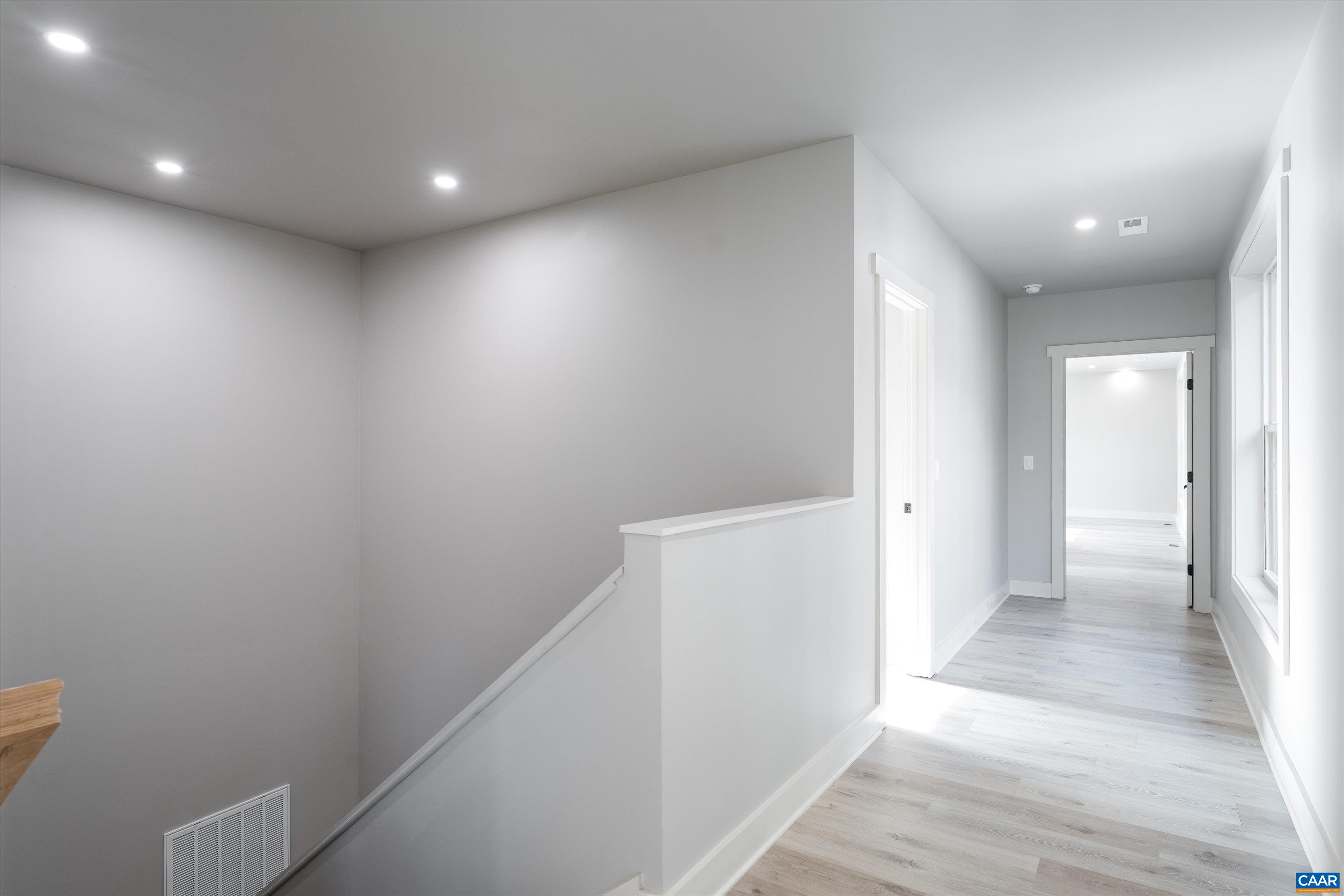 199 Ridgeview Drive Ruckersville, VA 22968 - Photo 51 of 72 a view of hallway with wooden floor