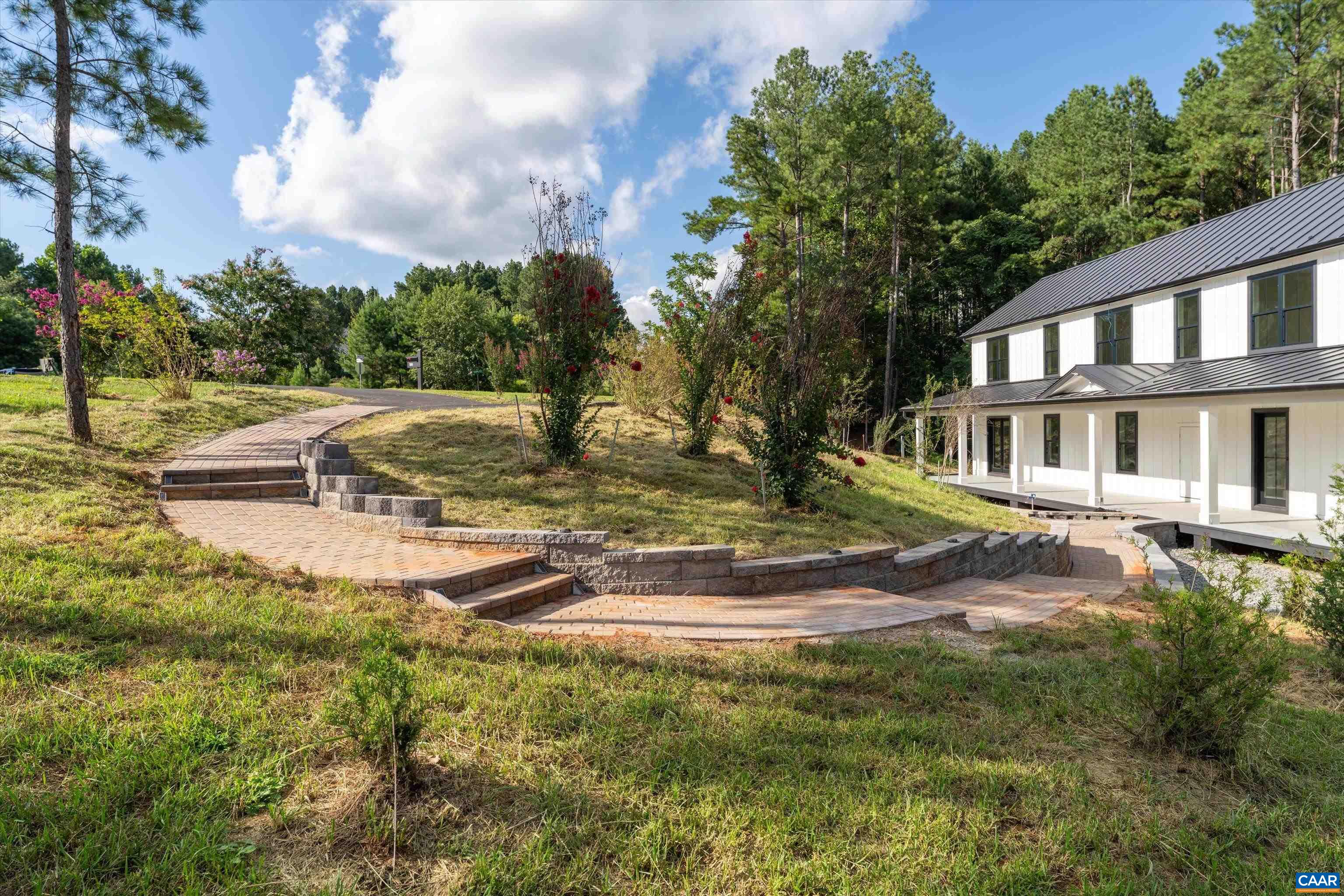 199 Ridgeview Drive Ruckersville, VA 22968 - Photo 65 of 72 a view of a house with a yard