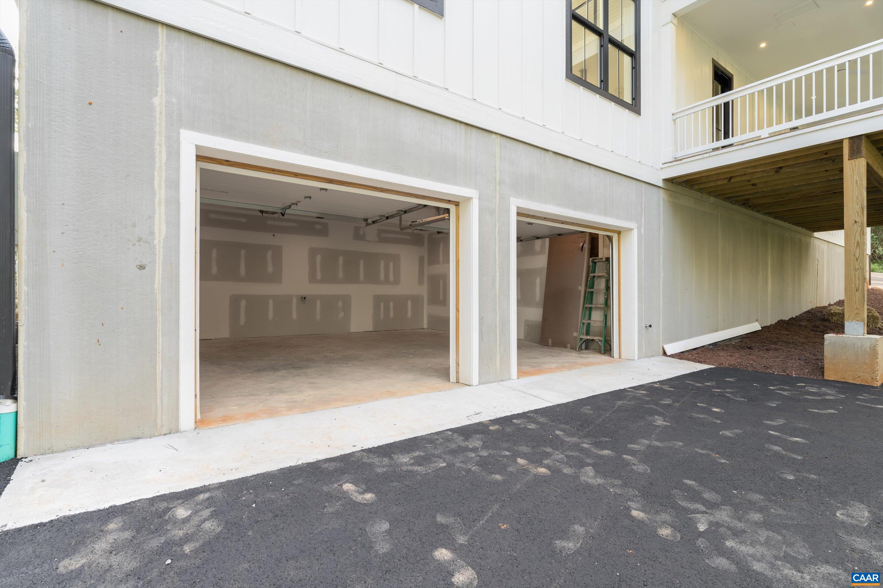 199 Ridgeview Drive Ruckersville, VA 22968 - Photo 69 of 72 a view of a hallway with wooden floor and a window