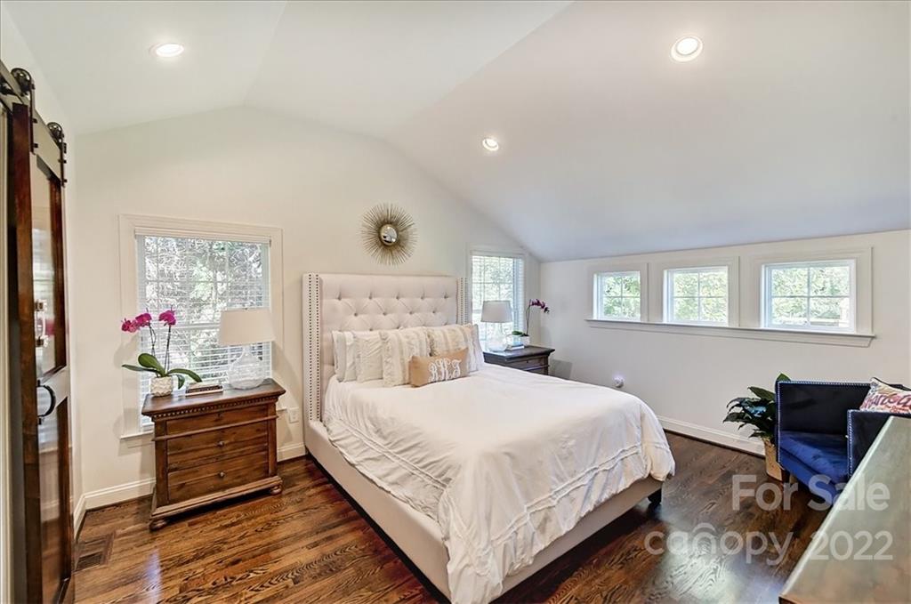 3421 Park Road Charlotte, NC 28209 - Photo 19 of 40 a bedroom with a bed and a window